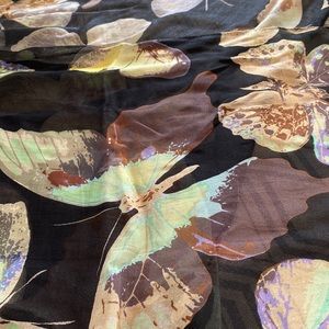 Butterflies represent beauty, transformation and eternity in a beautiful scarf